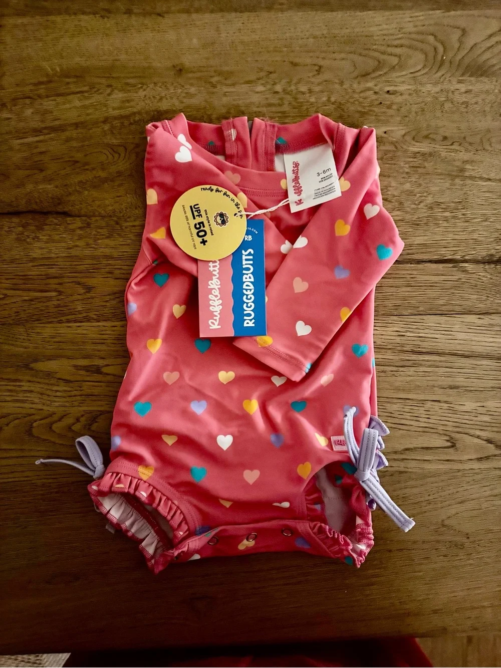 Rufflebutts Baby Pink Heart Print Swimsuit